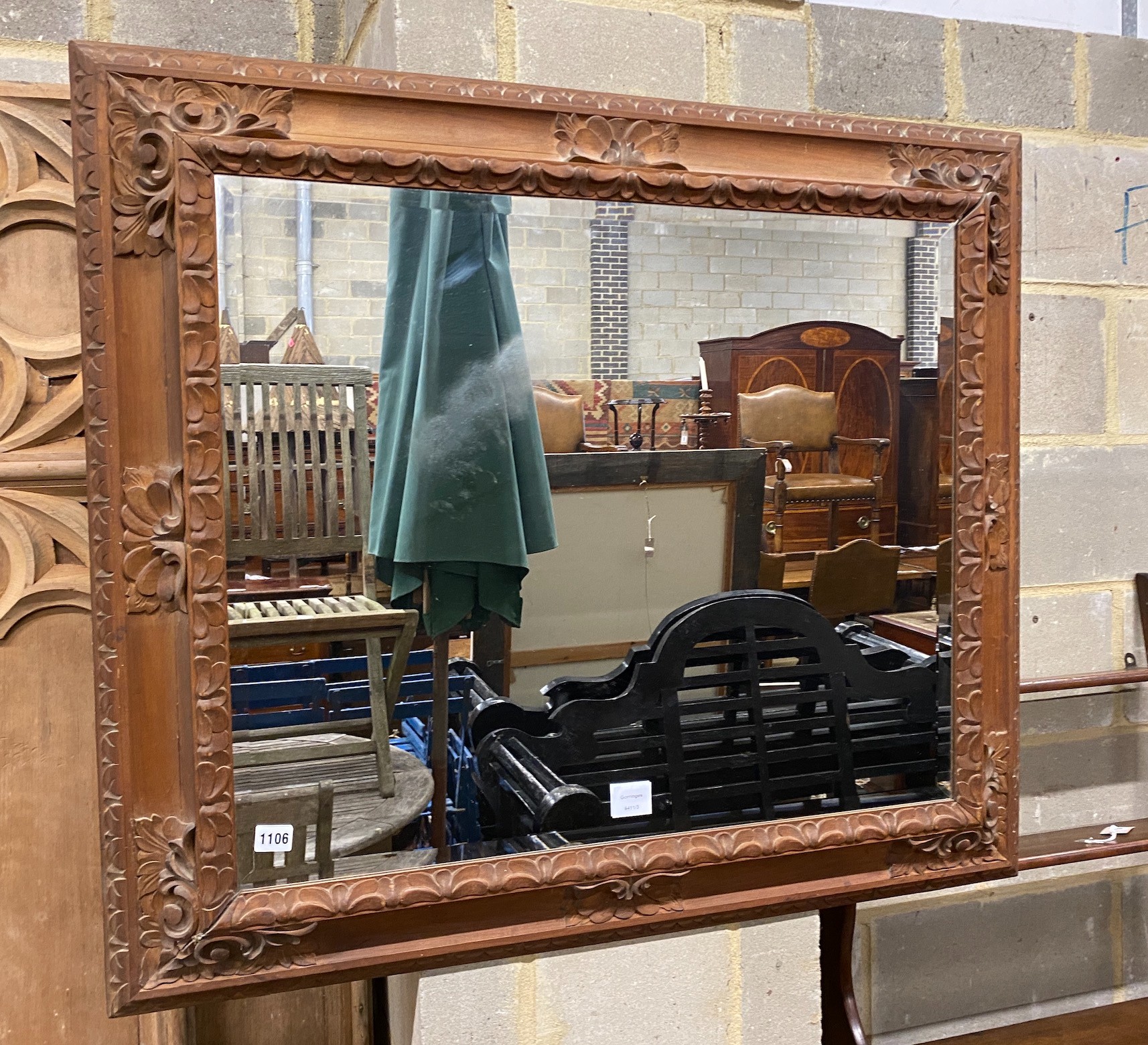 A Continental rectangular carved wood wall mirror, width 198cm, height 82cm and a small circular mirror